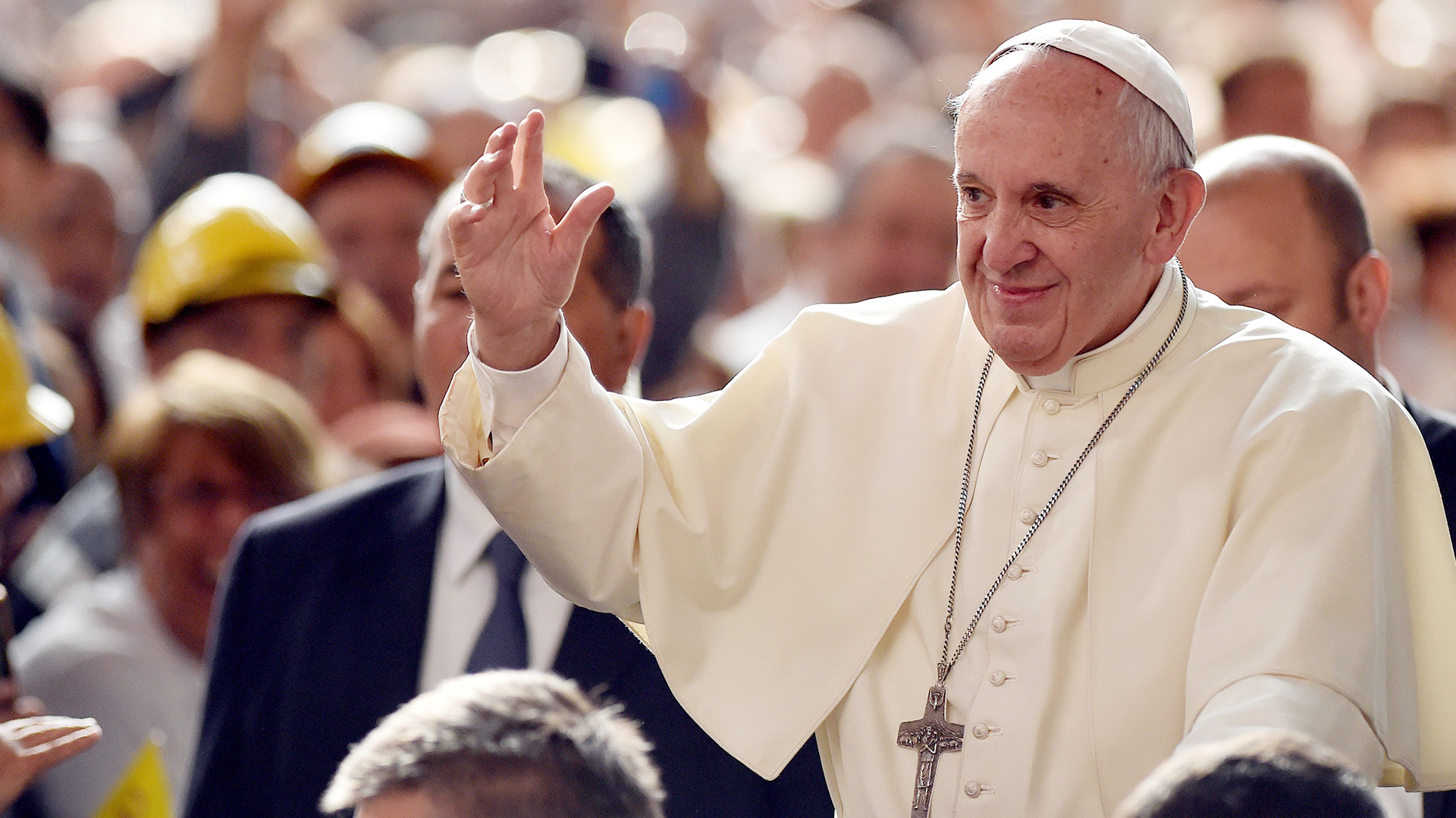 Pope Francis Waves As He Arrives At The Ilva Steel Plant During His 